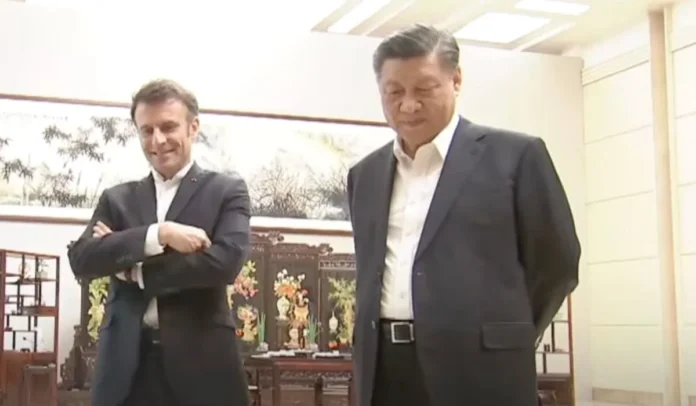 El presidente francés, Emmanuel Macron junto al presidente chino, Xi Jinping