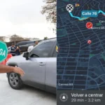 Captura de pantalla de la aplicación Waze que muestra una ruta congestionada en Barranquilla, indicando un tiempo de 29 minutos para 3.2 km.